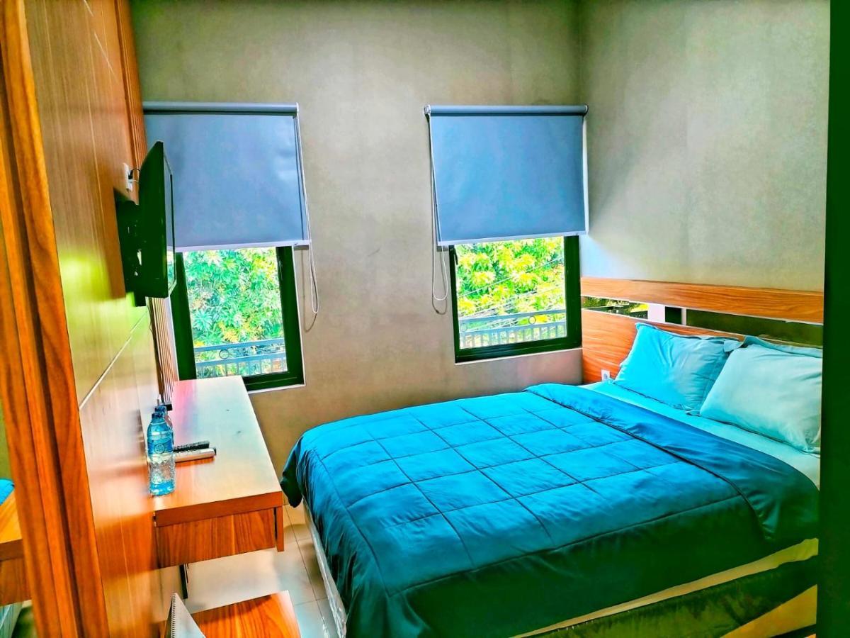 Cozy Tomang Hotel